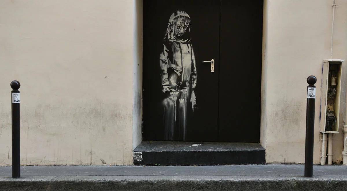 Praca Banksy'ego w hołdzie ofiarom ataku w sali koncertowej Bacatlan - skradziona